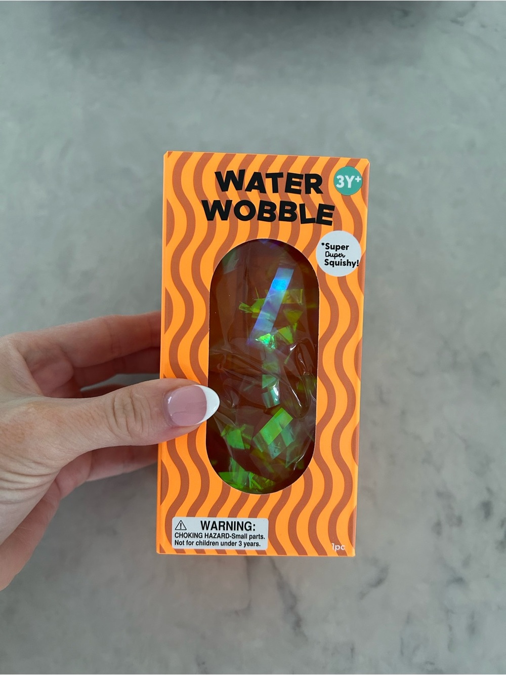 Water Wobble Squish Toy In Orange